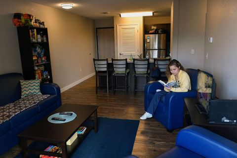 University Park living room with student